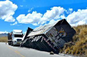 An 18 wheeler overturned on the highway.