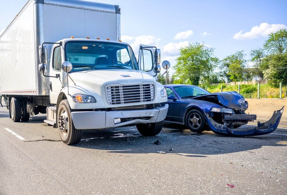 Accident involving a truck and a passenger automobile.