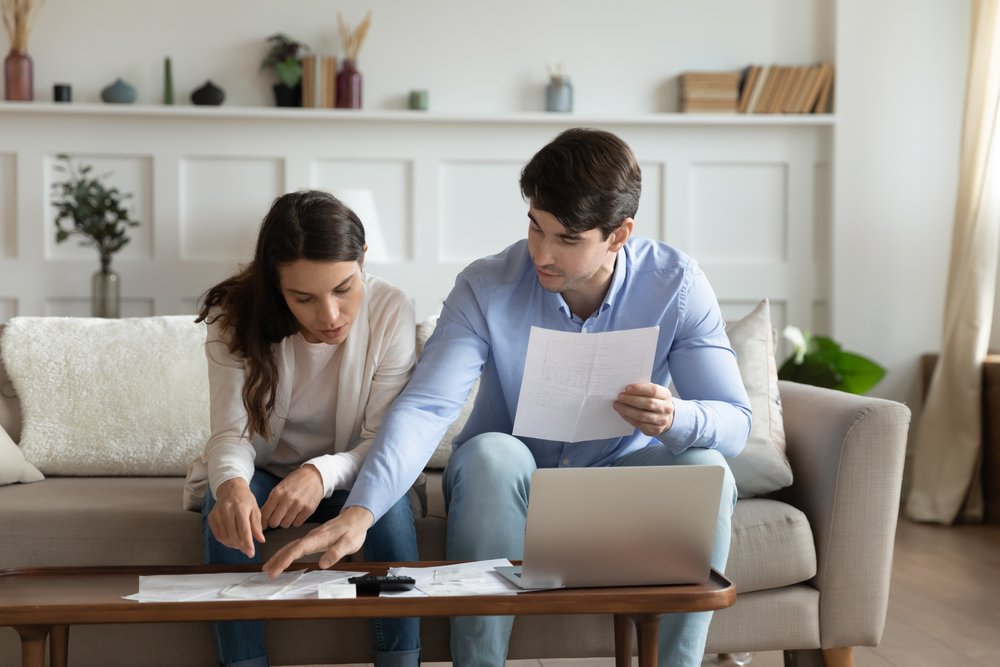 A couple preparing documents.