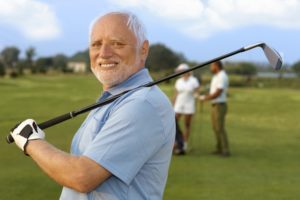 Elderly man out playing golf instead of appearing in court.