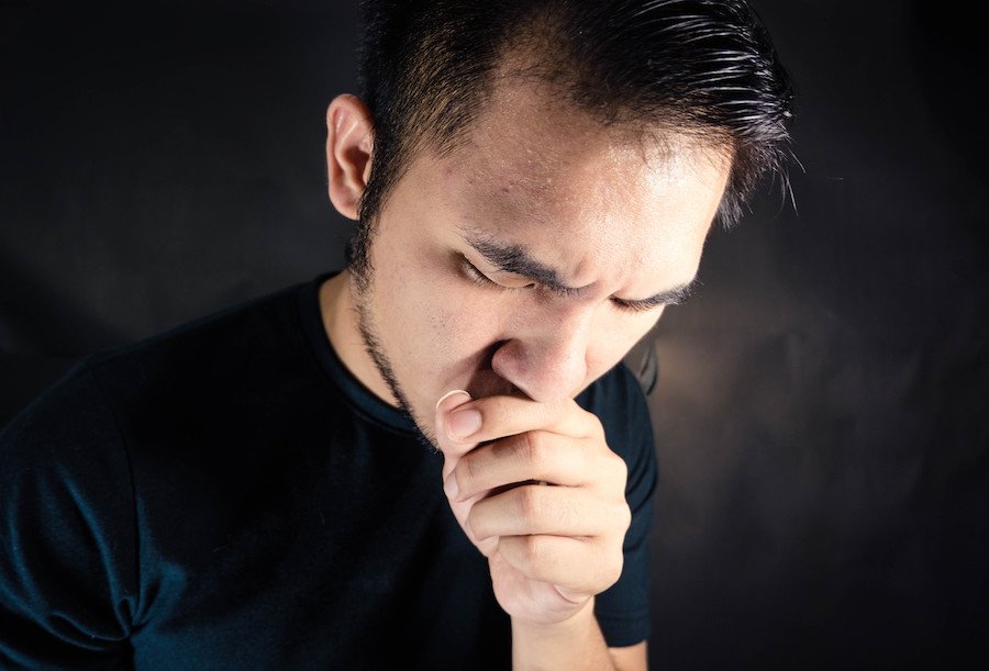 Man coughing after using CPAP