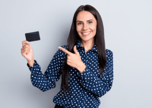 Young woman holding work card in Clark County