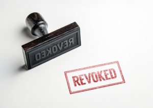 Stamp that says "revoked"