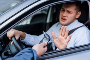 Underage driver resisting taking a breath test and surrendinger his license in accordance with NRS 483.462