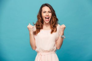 An excited young woman.