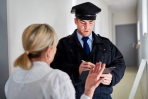 A woman filing a police report.