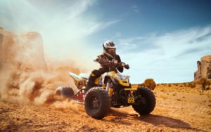 ATV vehicle against desert background