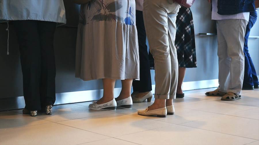 People on line at DMV to get their Nevada driving record