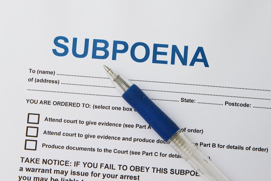 Subpoena with pen