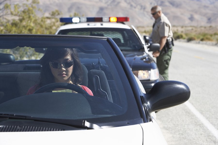 Cop pulling over driver who has a history of traffic tickets