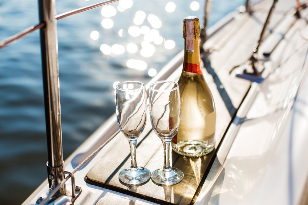 A bottle of champagne on a yacht.