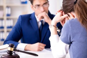 An attorney hearing out his client's story.