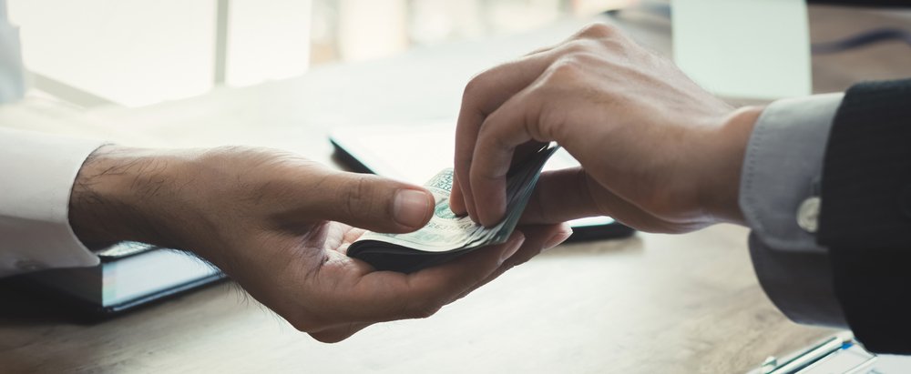 Money changing hands.