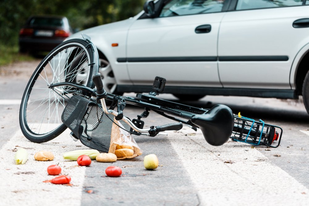 A bicycle turned over after an accident.