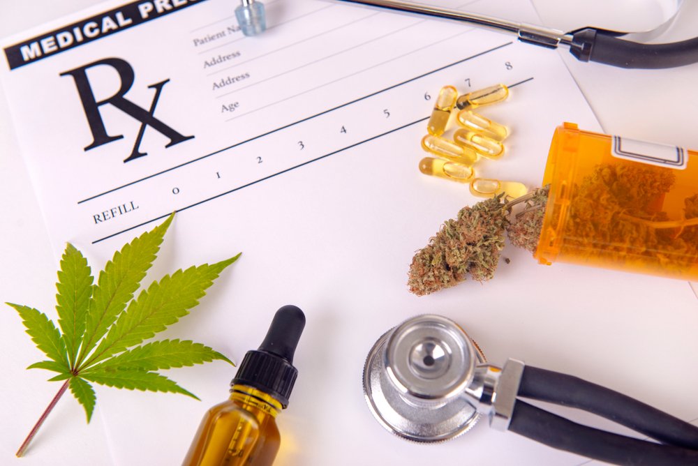 Various marijuana products on a prescription pad.