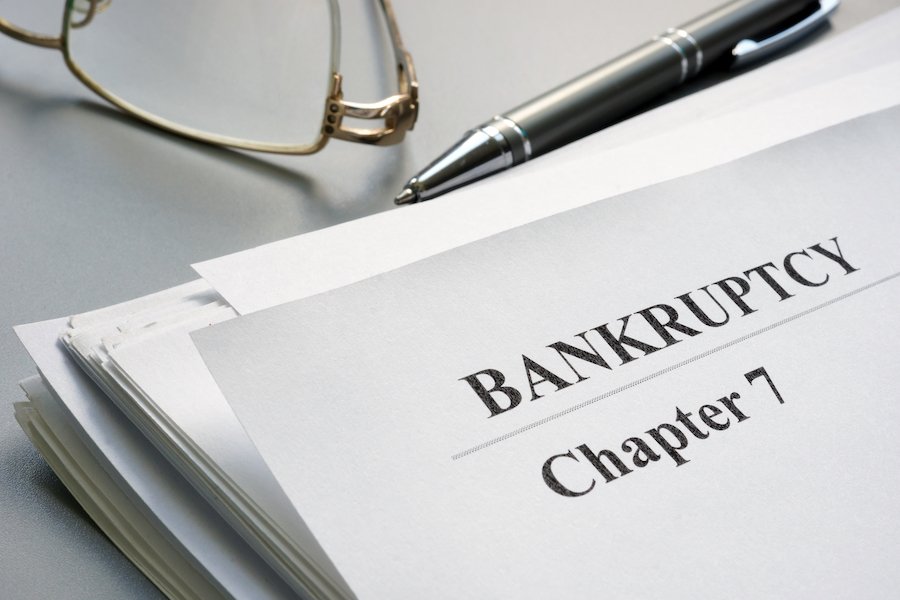 Paper that says "bankruptcy: chapter 7" 