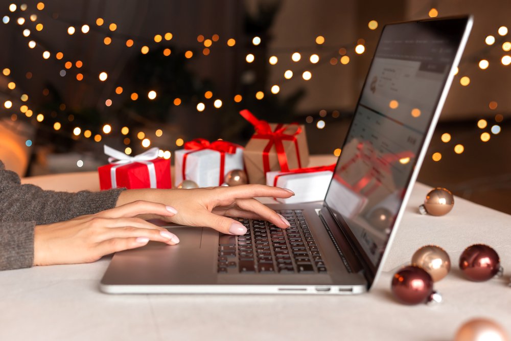 An employee working on her laptop during the holidays.