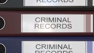 binders that say "criminal records" on the spine