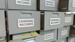 filing cabinets labeled "criminal records" 