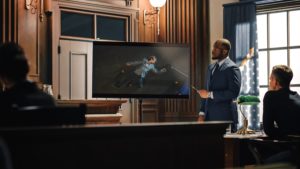 Defense attorney showing court an exhibit during a trial