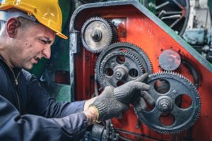 Man in hard hat injured while turning wheel