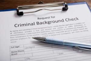 paper that says "criminal background check", which is one of the documents you need to get a record seal