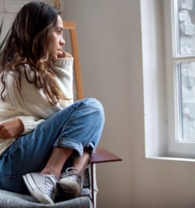 Young teen girl looking scared