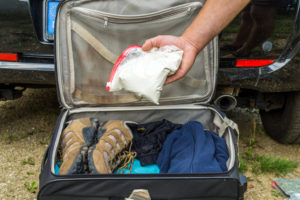 A bag of cocaine found in a suitcase.