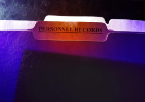 File folder labelled "Personnel records"