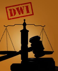 Court gavel and scale of justice with DWI text