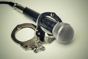 handcuff and a microphone