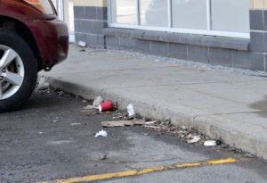 Curb where litter has gathered