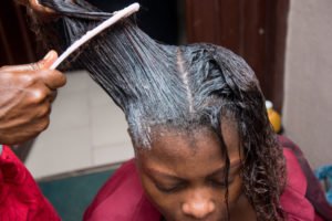 Woman in salon getting a hair treatment