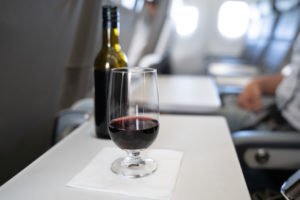 red wine on airplane tray