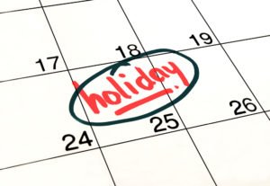 A date circled on a calendar inscribed "Holiday!"