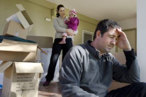 Dad in despair as ex-wife holding child packs to move.