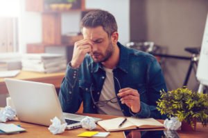 A stressed out employee considering taking "stress leave" from his job.