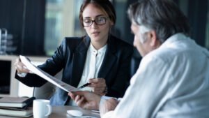 Lawyer consulting with client in an office