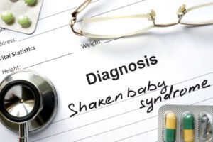 Doctor's note that says, "Diagnosis: Shaken Baby Syndrome" 