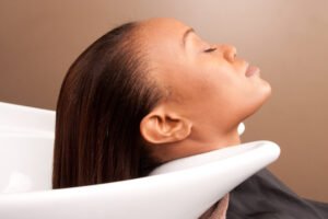 Woman in hair salon about to get her hair washed