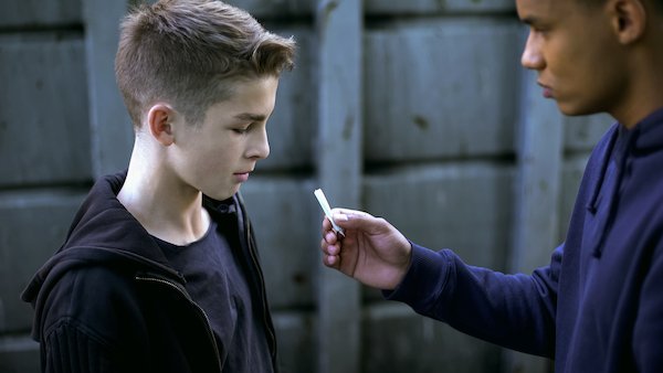 Young boy being given drugs