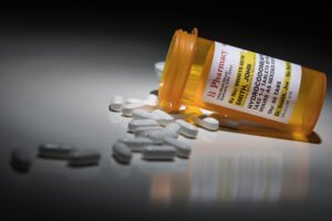 Botella de Vicodin derramada