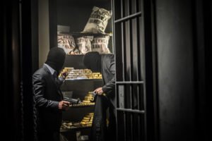Dos hombres robando un banco en violación de 18 U.S.C. § 2113