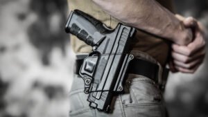 Closeup of gun on man's belt