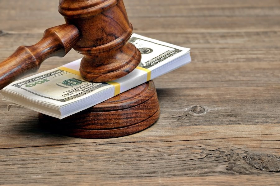 Judge's gavel and a wad of cash