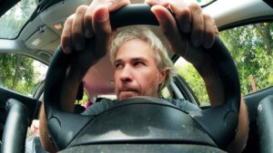 Man behind the wheel while joyriding