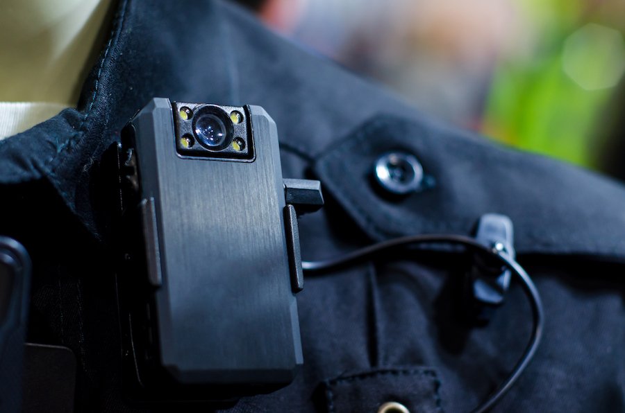 Closeup of bodycam camera on a police's lapel, which can be used to capture drunken behavior by a DUI suspect