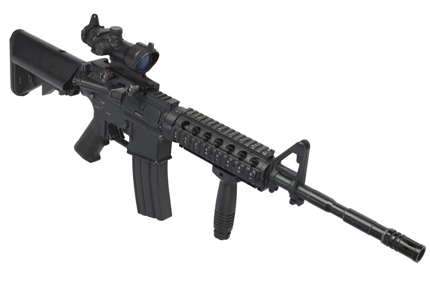 Machine gun against a white background