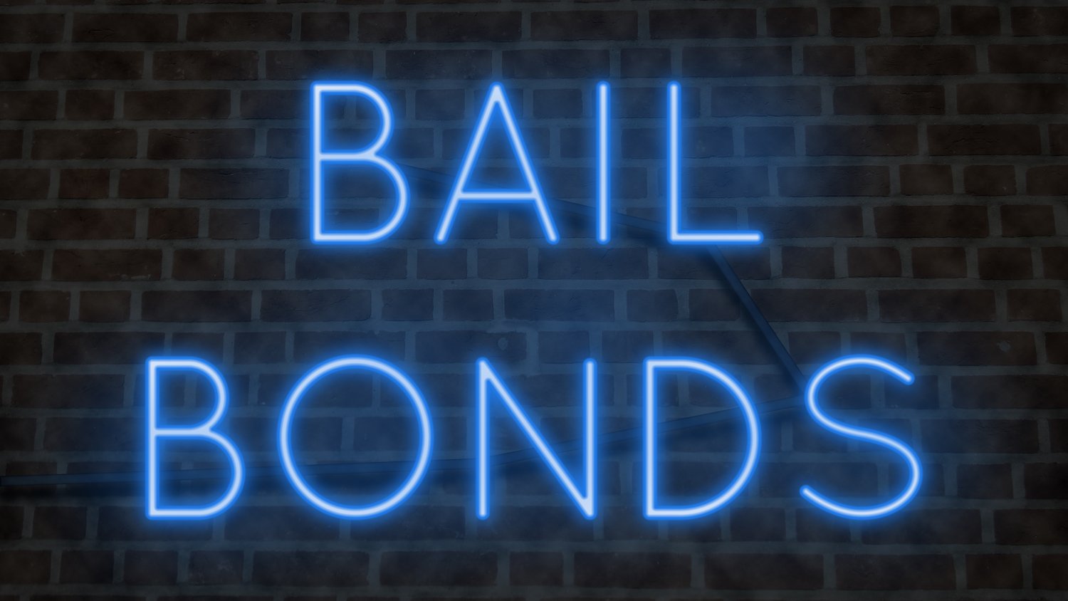 Store sign that says "Bail Bonds" against a brick wall