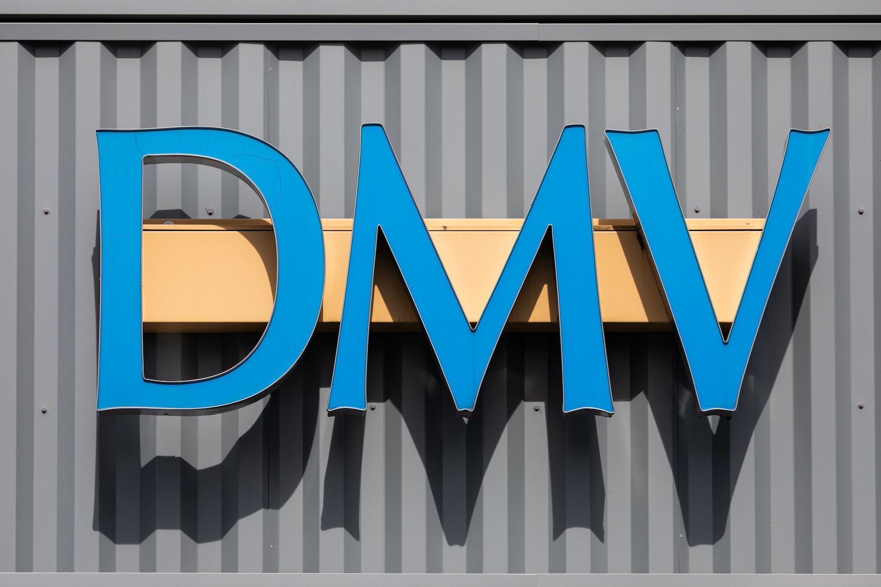 Exterior or DMV office with DMV sign